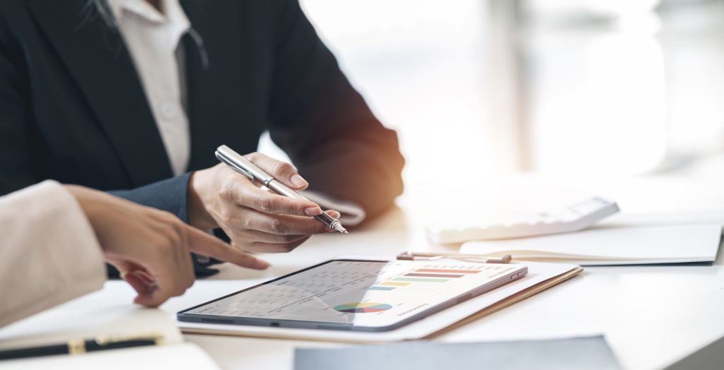 Client reviewing advisor fees and compensation
